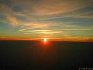paisaje de puesta de sol desde el avi�n al regreso